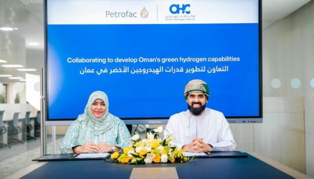 To go with story by Edward Reed. Petrofac has signed a memorandum of understanding (MoU) with Oman Hydrogen Centre (OHC), with a particular focus on green hydrogen.  Picture shows; Petrofac signs an MoU on green hydrogen in Oman. Oman. Supplied by Petrofac Date; 14/09/2022